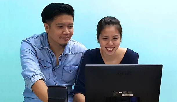 Two young people following the EPHOD seminars online